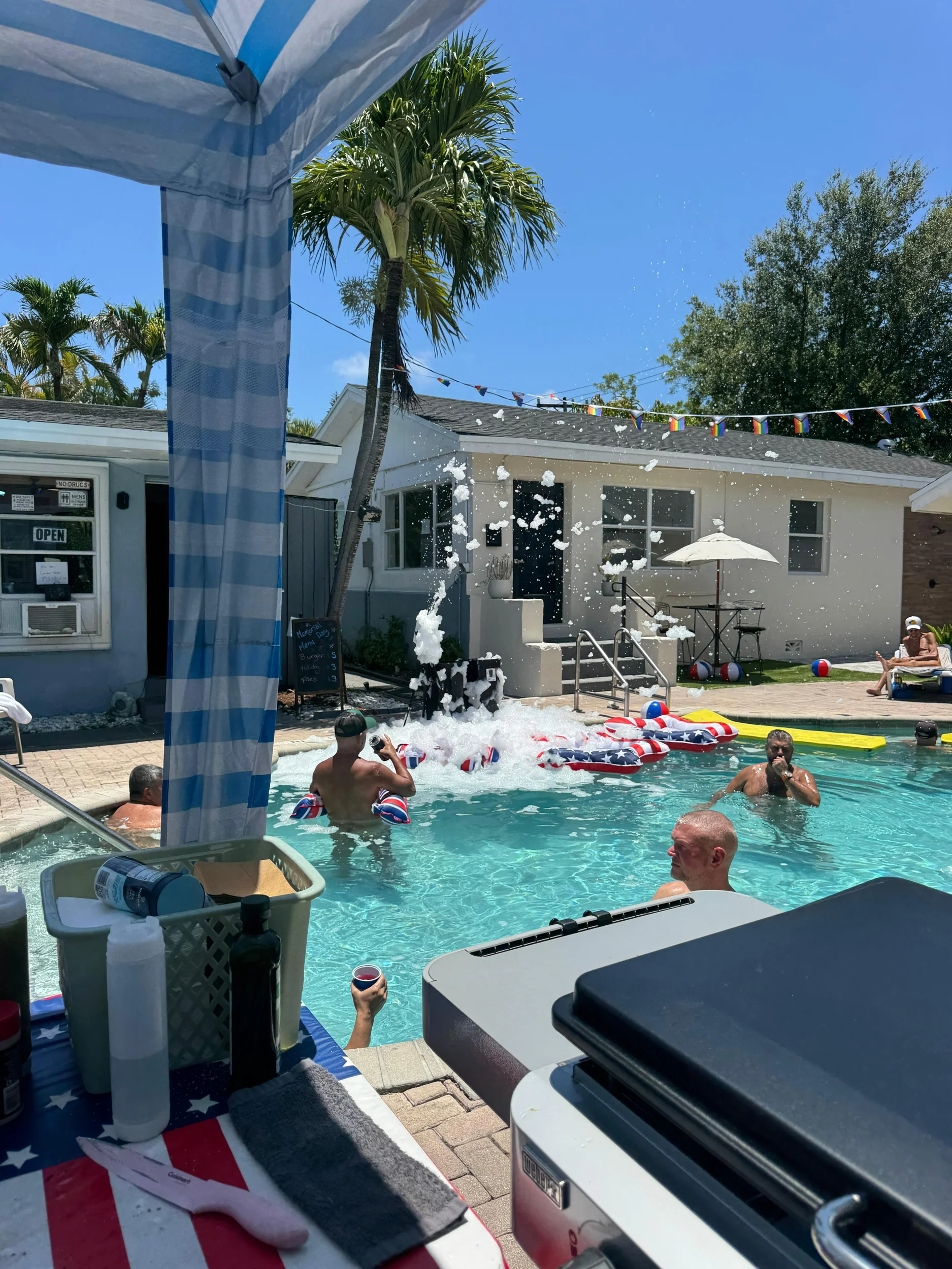 Men in the pool with foam